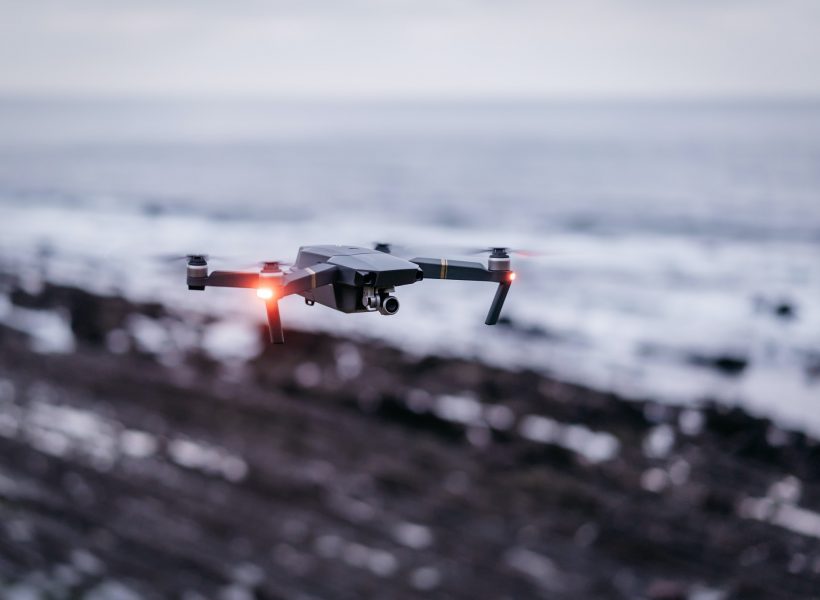 Drone flying near sea